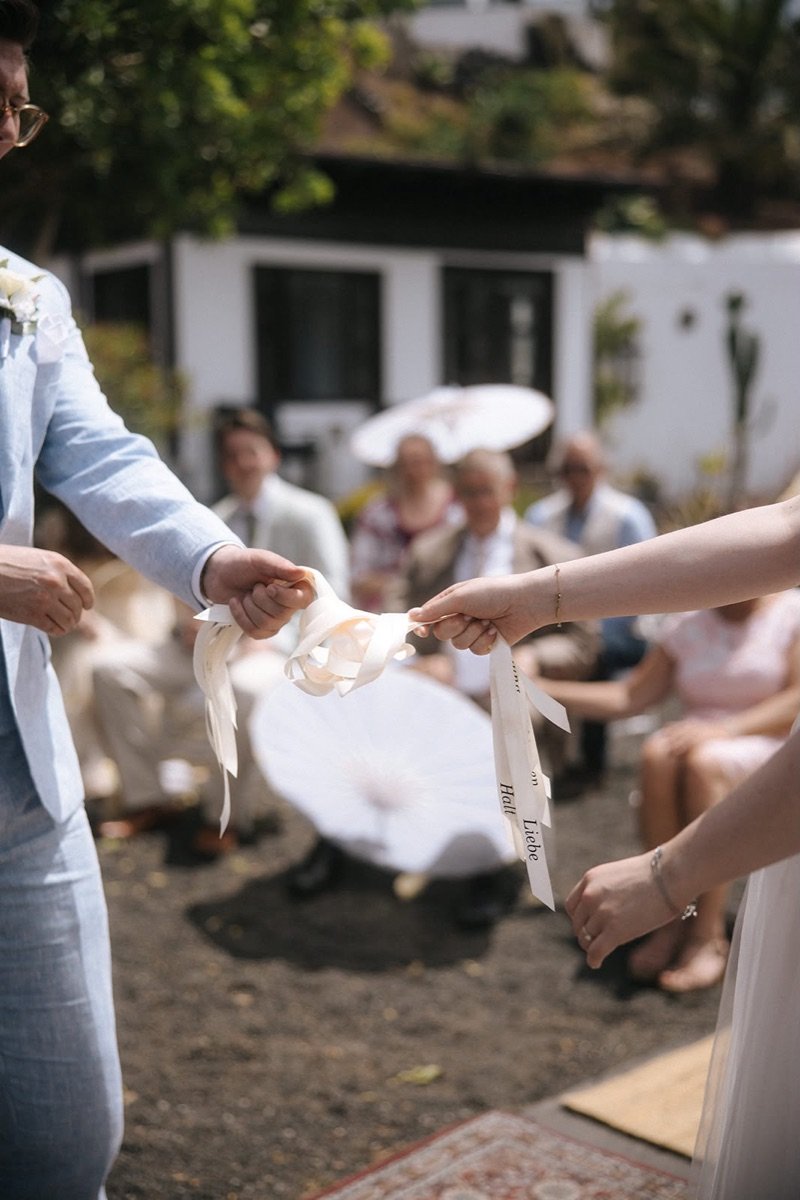 Couple sharing a meaningful ritual during their wedding ceremony